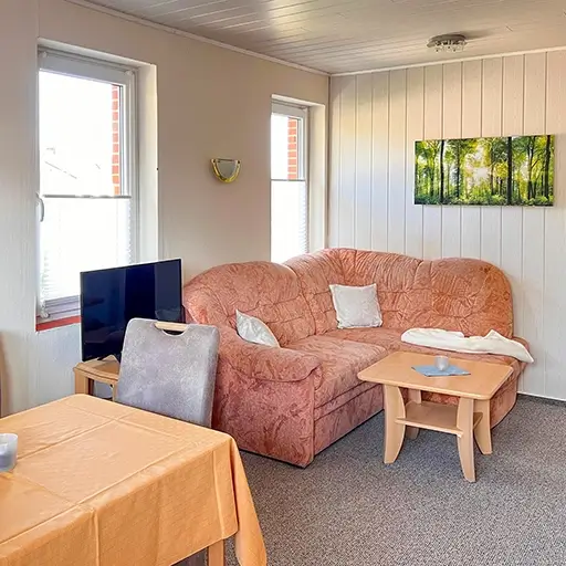 Wohnzimmer mit Küche