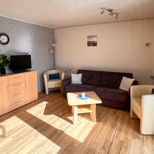 Wohnzimmer mit Küche
