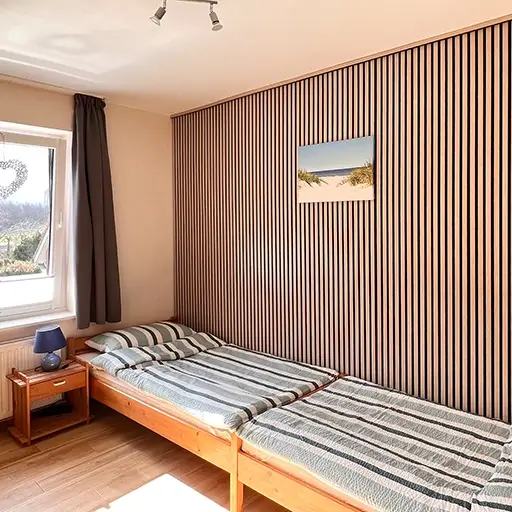 Schlafzimmer mit getrennten Betten